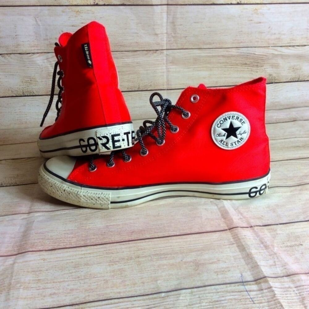 Converse GoreTex orange high tops. 12